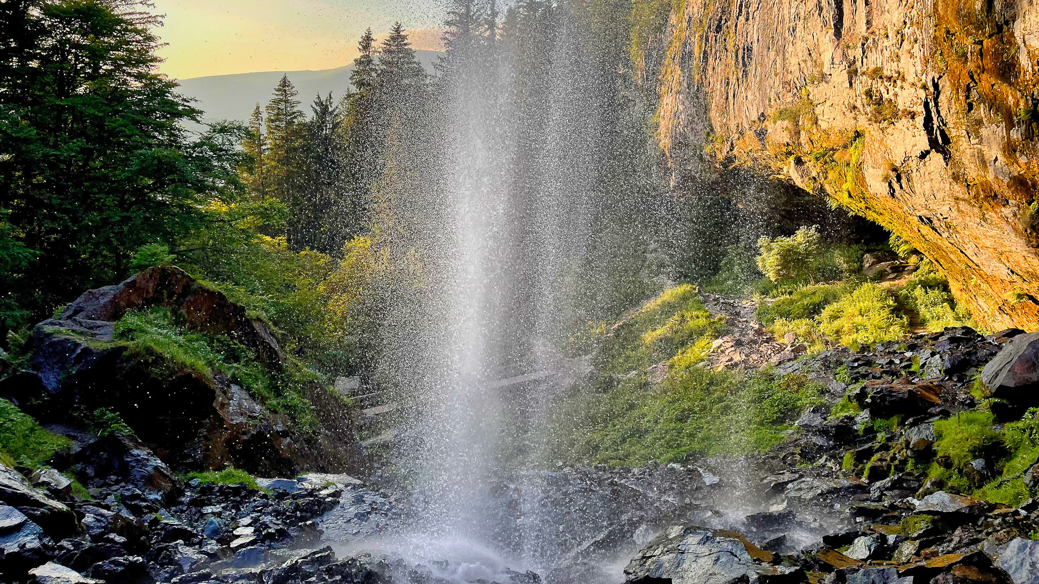 La Grande Cascade du Mont Dore: Evening Sunlight Illuminating the Majestic Waterfall